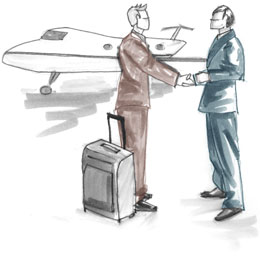 An international traveler is greeted at an airport.